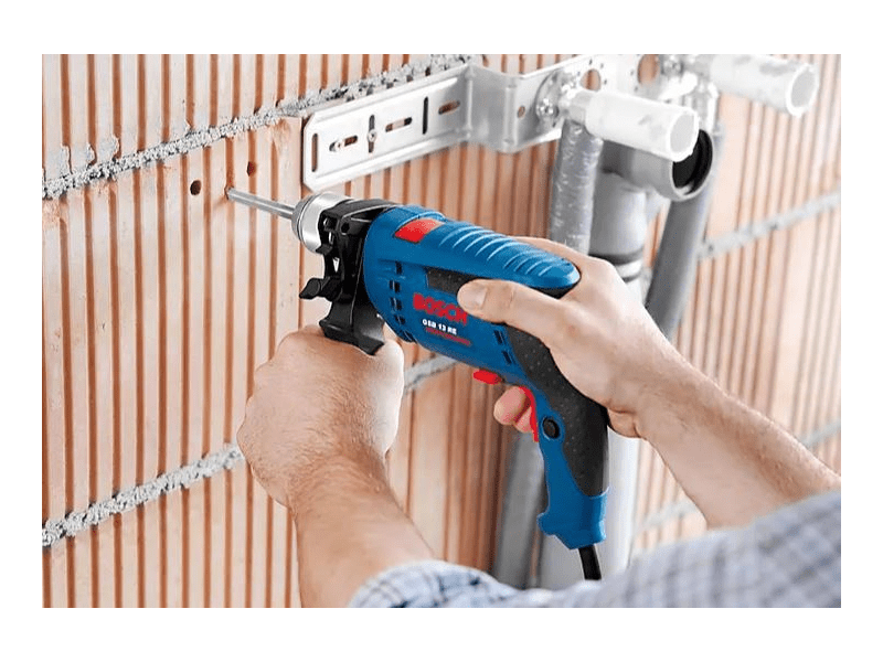 Bosch GSB 13 RE Ütvefúrógép + 4 részes fúrófej készlet + koffer (0601217103)